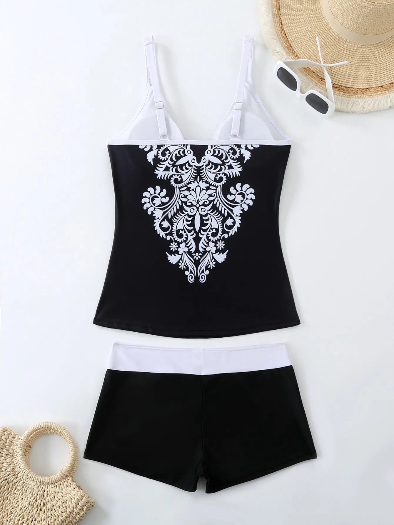 Women's plus size black and rose red swimsuit set with briefs, made from polyester with cotton lining.