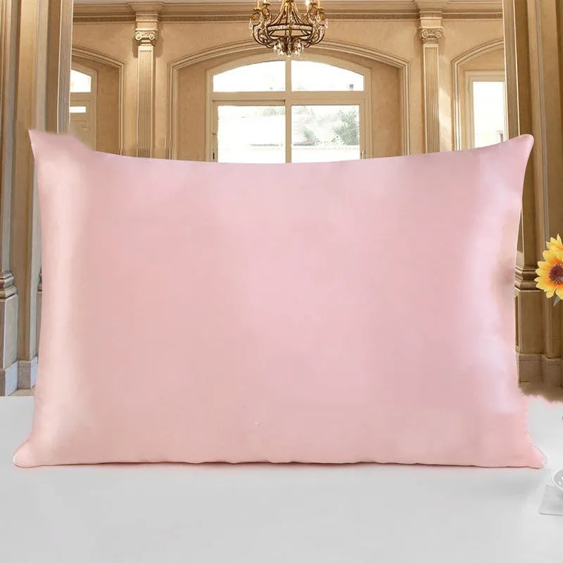 Double-sided 19 M silk pillowcase in apricot colour, showing smooth satin weave texture.