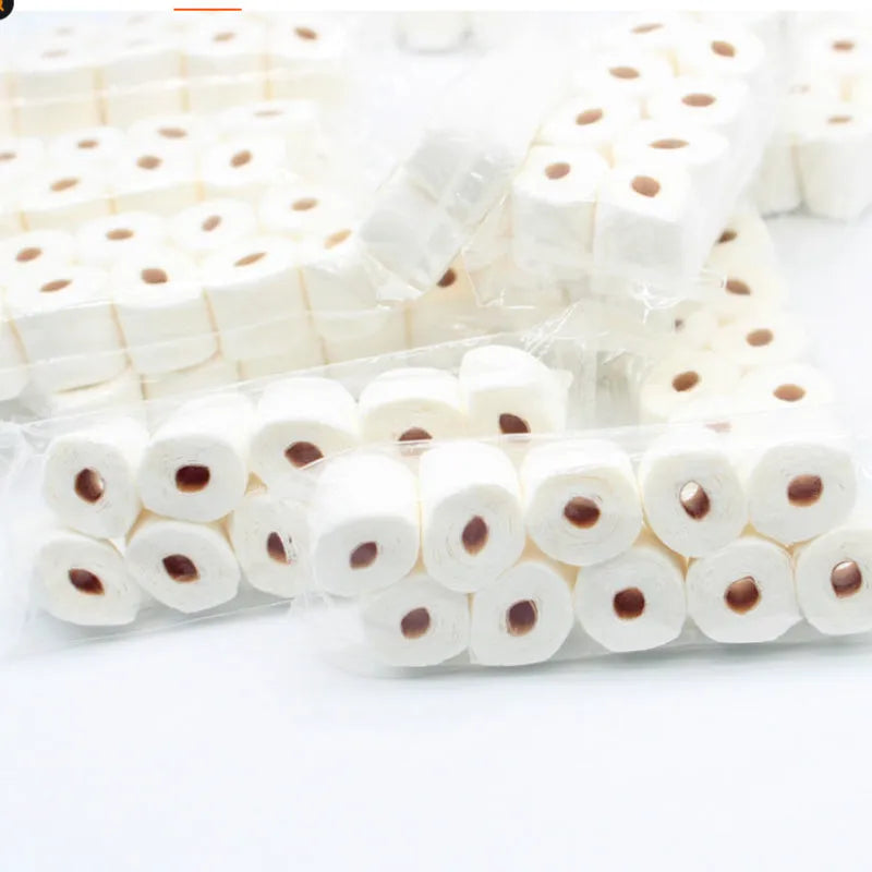 Paper simulated tissue roll model measuring 30mm wide 15mm deep 80mm tall