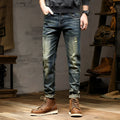 Men's retro blue stretch denim jeans with zip fly, shown in a slim-fit style