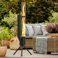 Vertical iron wood burning rocket furnace stove for courtyard heating and decoration.