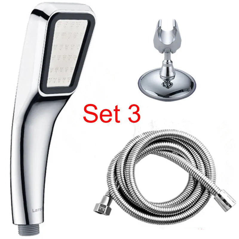 Orange hand-held pressurised shower head with rain function, part of a complete shower set