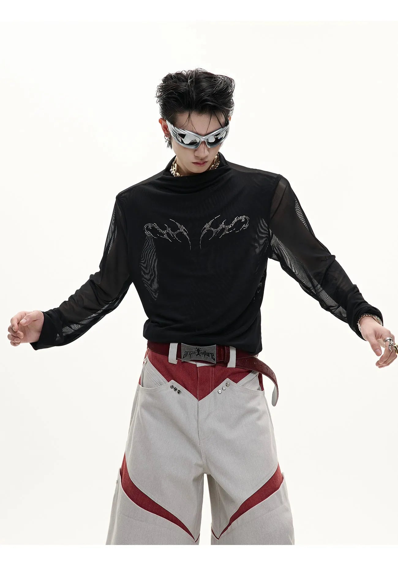 Black mesh slim-fit long sleeve base layer shirt laid flat, showing its texture and cut.