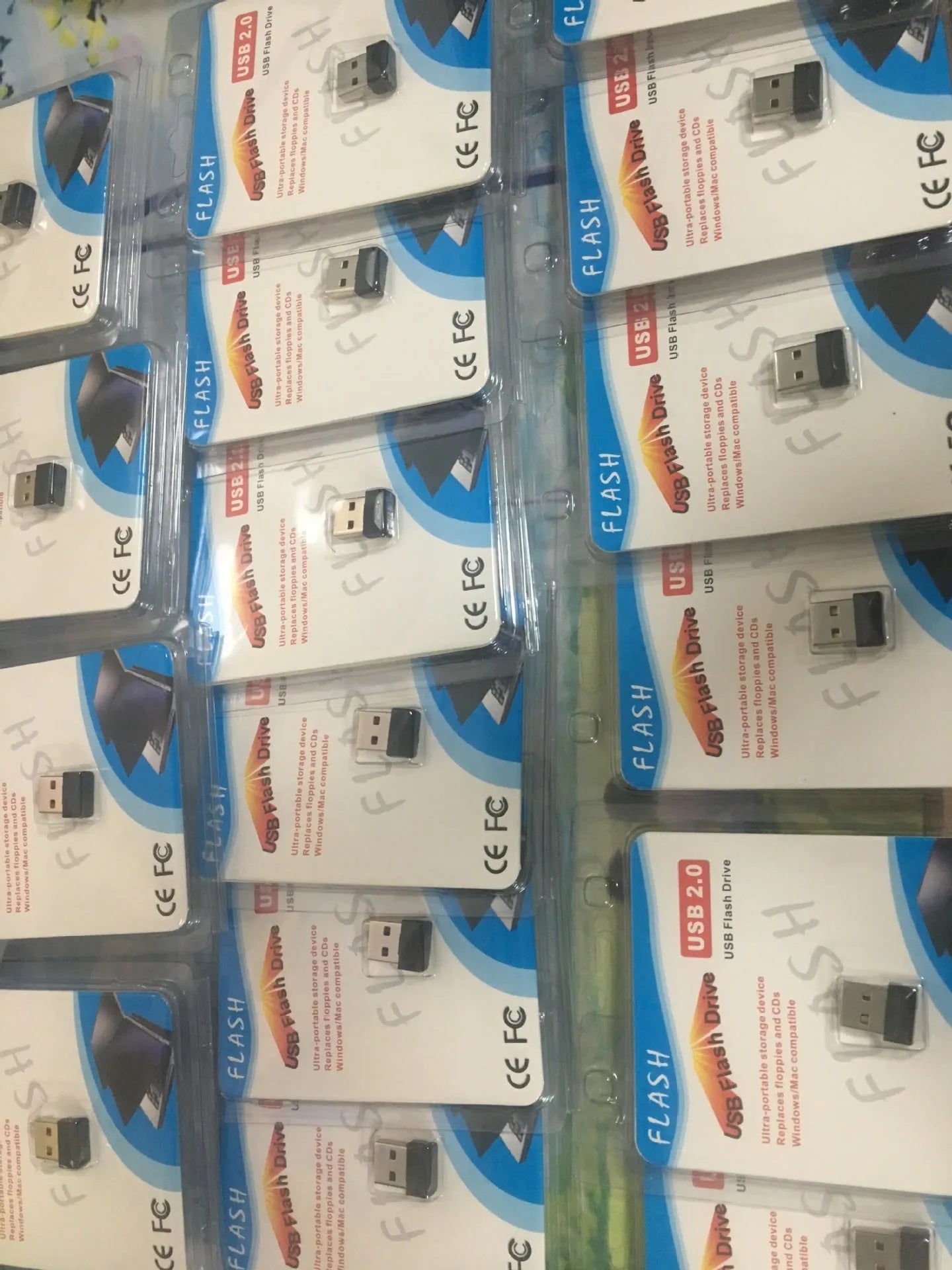 Black USB 2.0 flash drive with plastic shell, 2GB capacity, compact 2.3 x 1.5 x 0.8 cm size