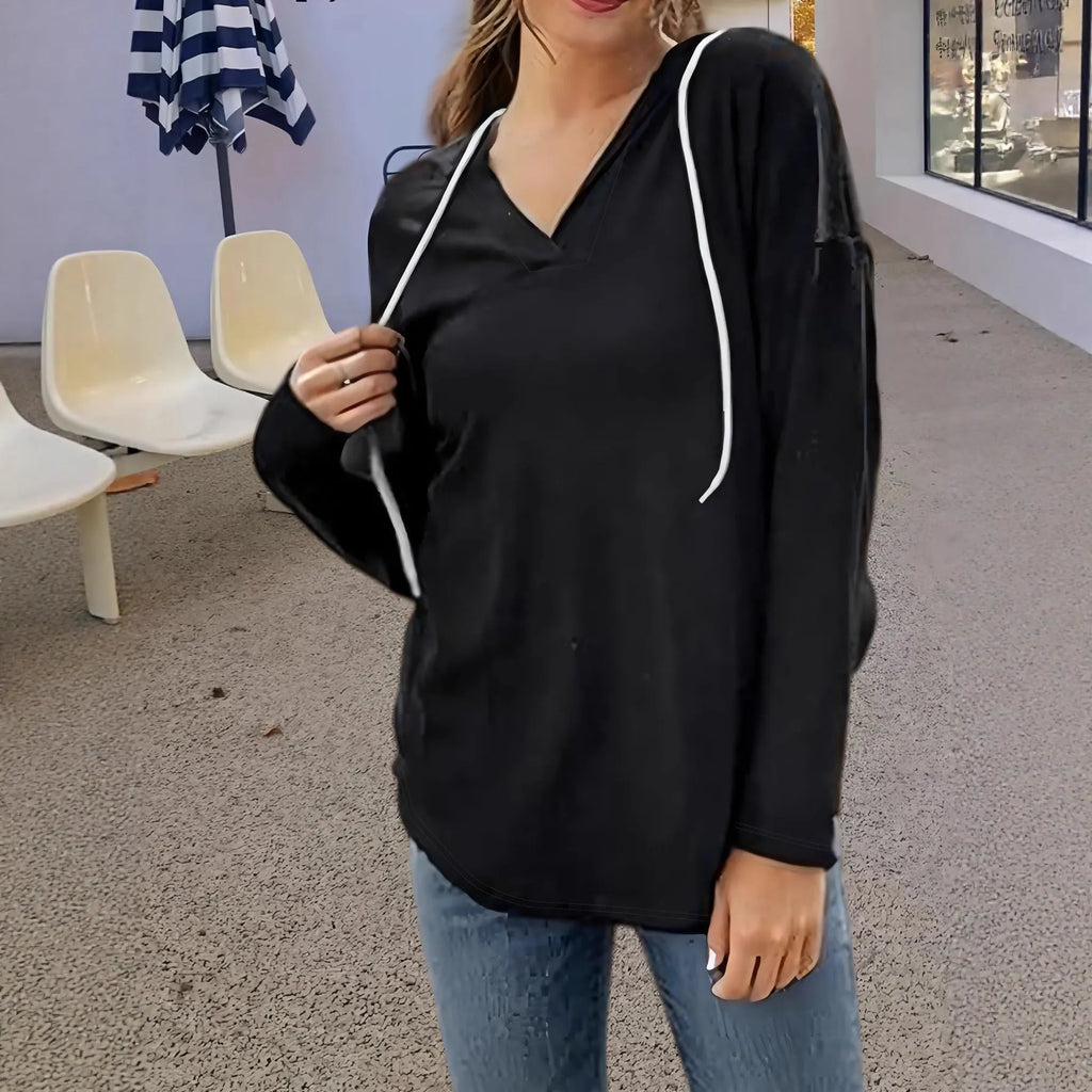Women's black V-neck hooded sweatshirt with long sleeves on hanger