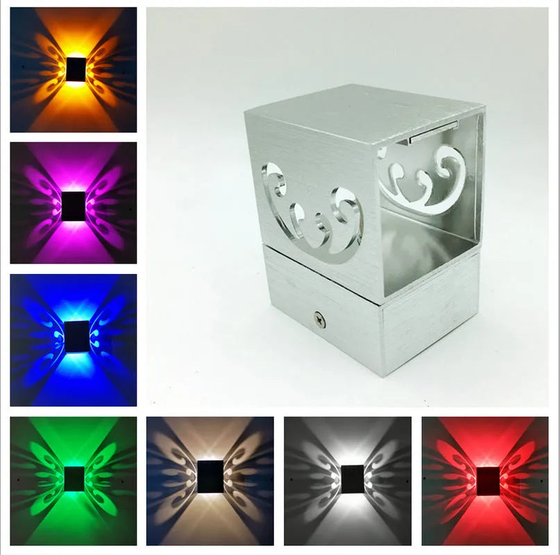 Butterfly-shaped LED wall lamp with aluminium shade and remote control for colour selection