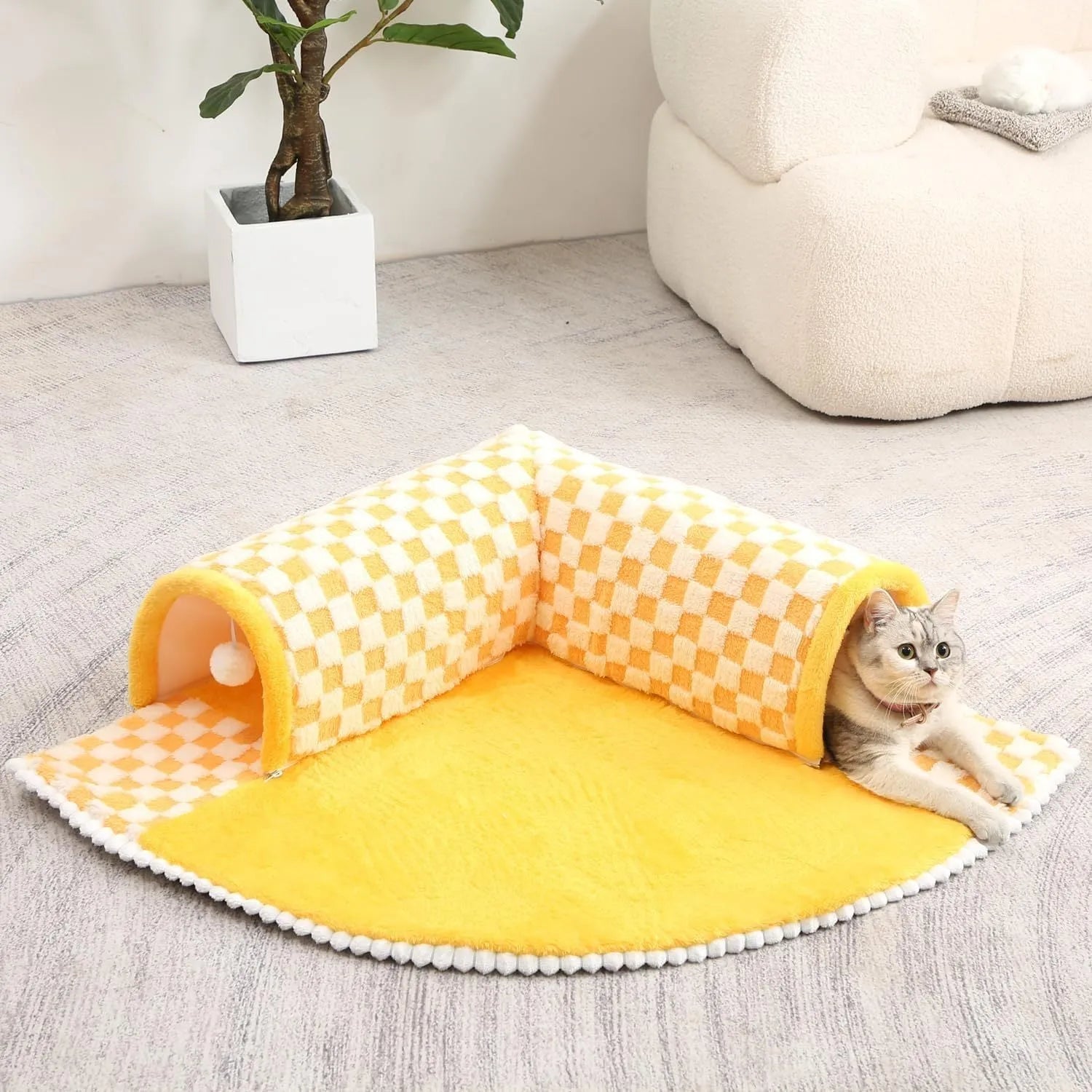Fan-shaped plush pet bed with integrated tunnel for cats and dogs in coffee colour.