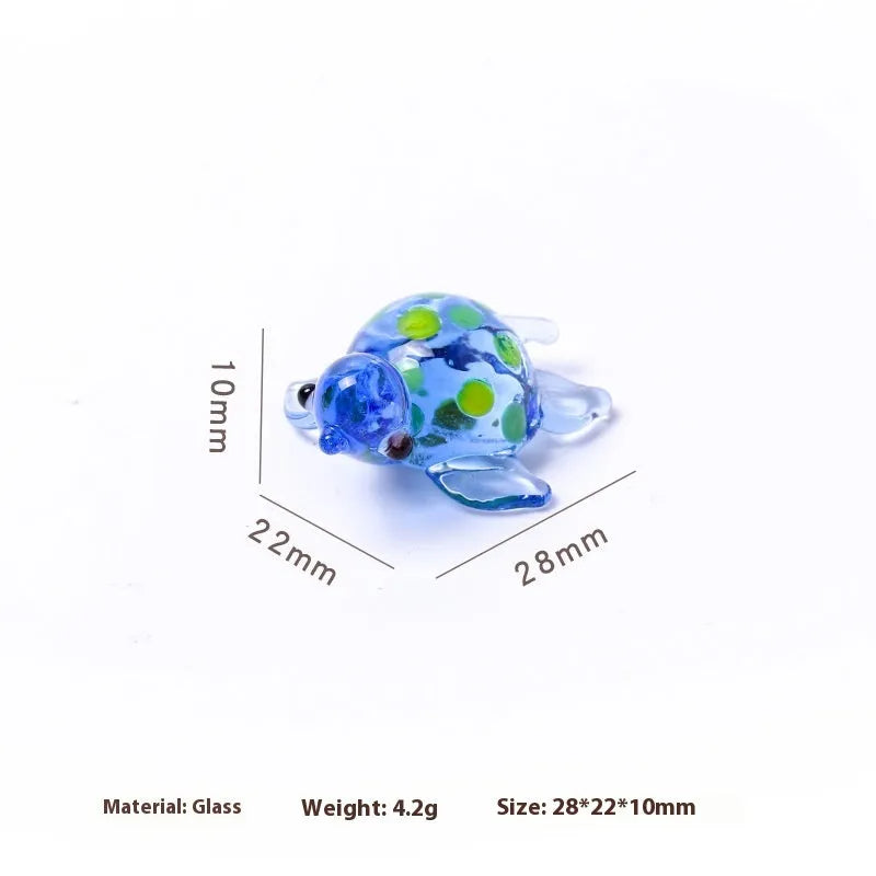 Glass turtle ornament with geometric modern design in six colour variations for desktop decoration