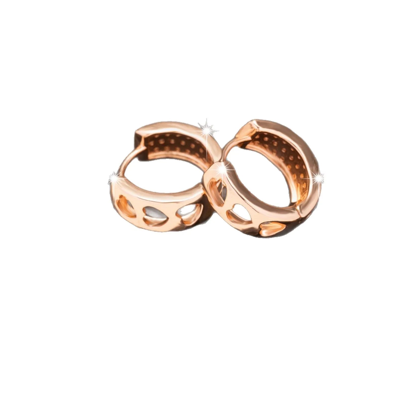 Rose gold heart-shaped women's earrings with three hollowed out sections in a circular design.