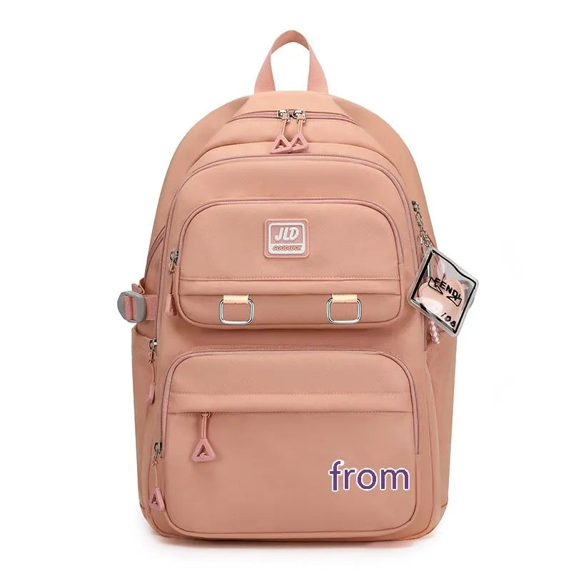 Large capacity nylon school backpack for girls in a choice of colours and patterns, showing ergonomic backplate.