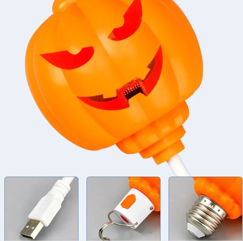 Plastic pumpkin decorative lamp with USB charging port in yellow or purple light options