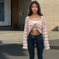 Striped long-sleeved pullover sweater in mercerized cotton shown in multiple colours with front and back wearable design.