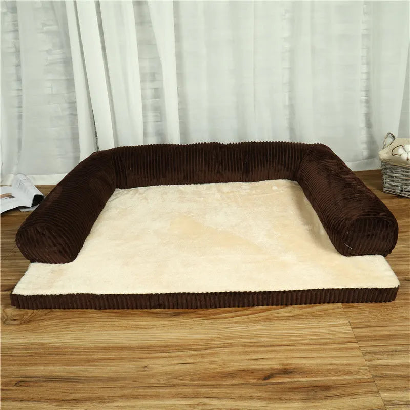 Corduroy dog sofa bed with raised sides in grey colour, showing non-slip base and cushioning.