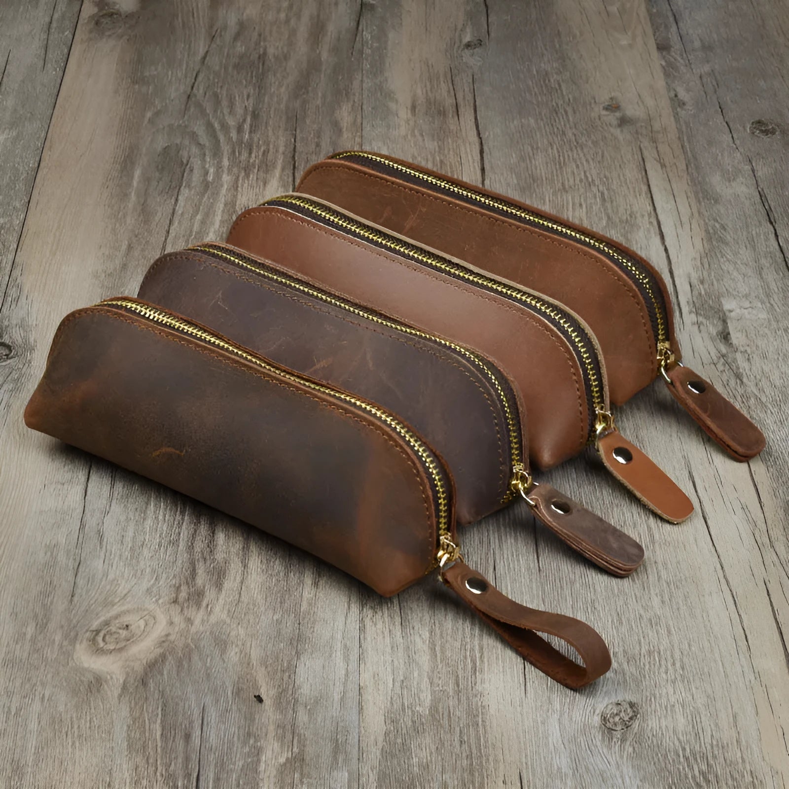 Black handmade cowhide leather pencil case with zipper, showing square 18cm design.