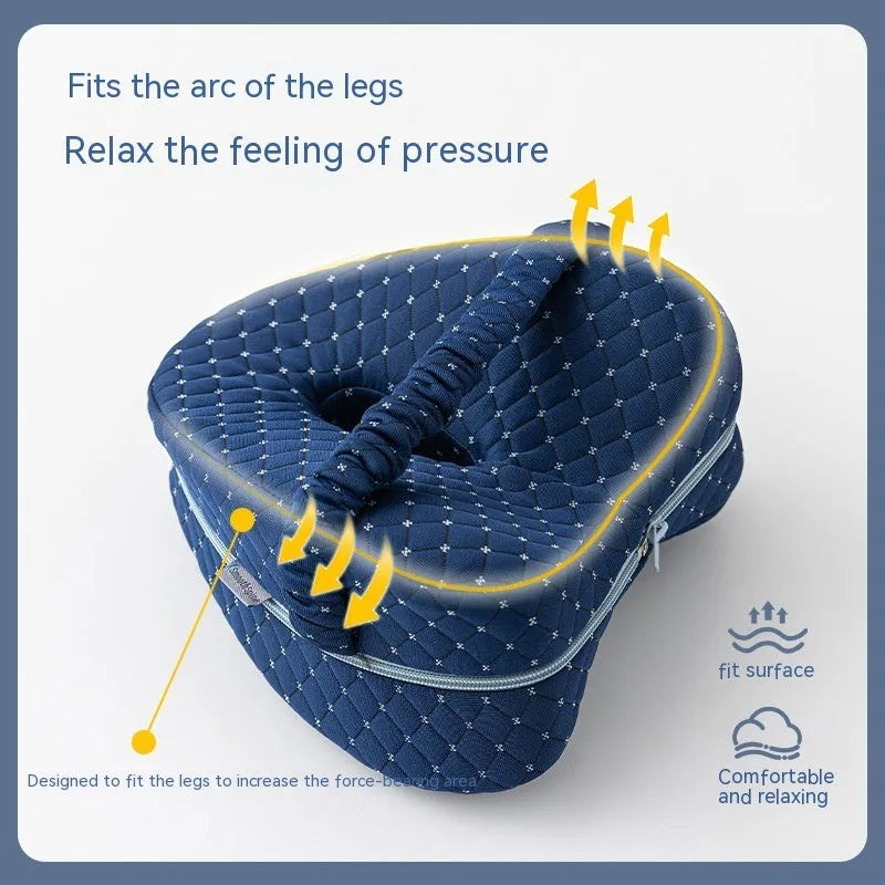 Heart-shaped memory foam leg pillow in blue colour showing 25x23x13cm dimensions
