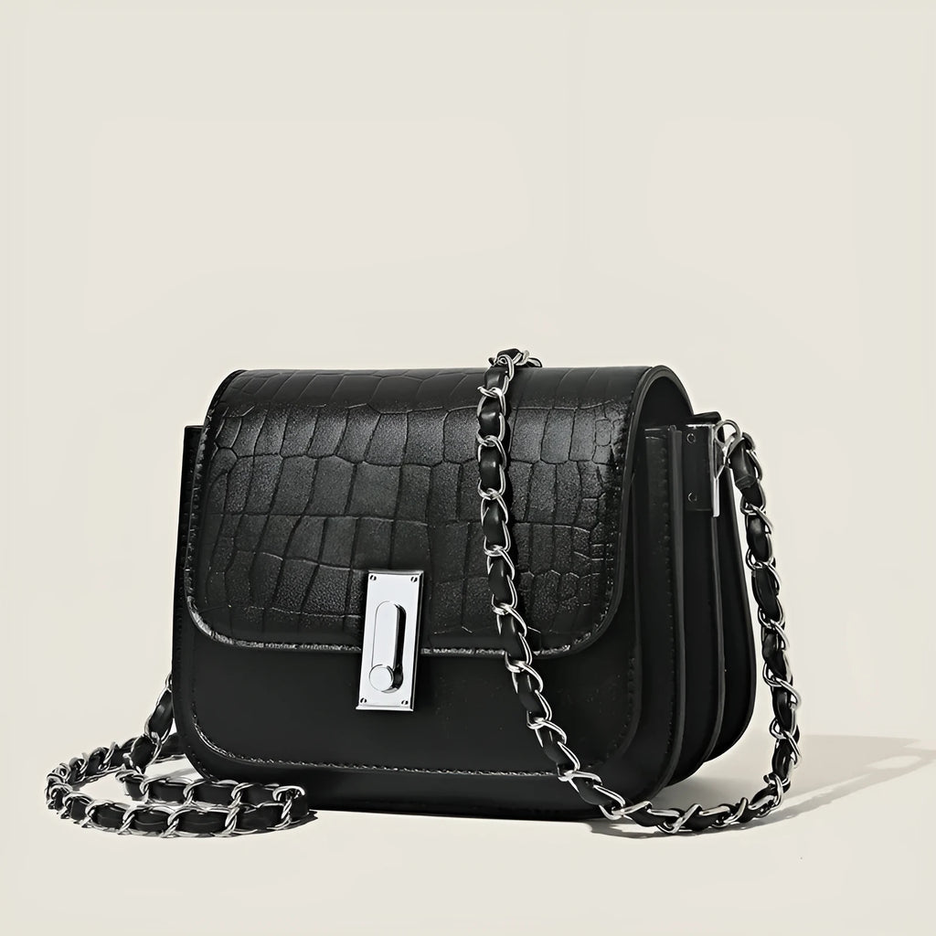 Women's soft PU leather shoulder bag with chain strap in horizontal square shape showing sandwich pocket design