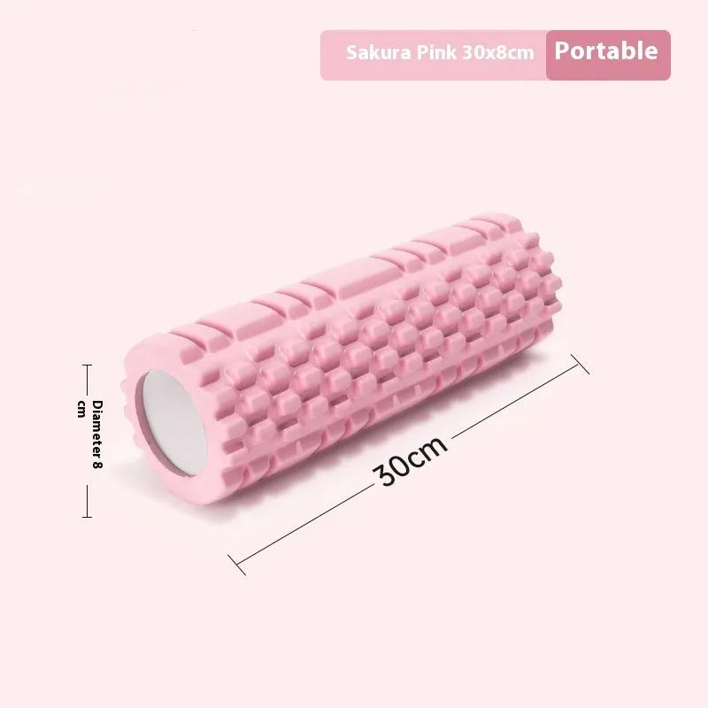 A black EVA foam roller for fitness and muscle recovery, shown next to a grey and pink version.