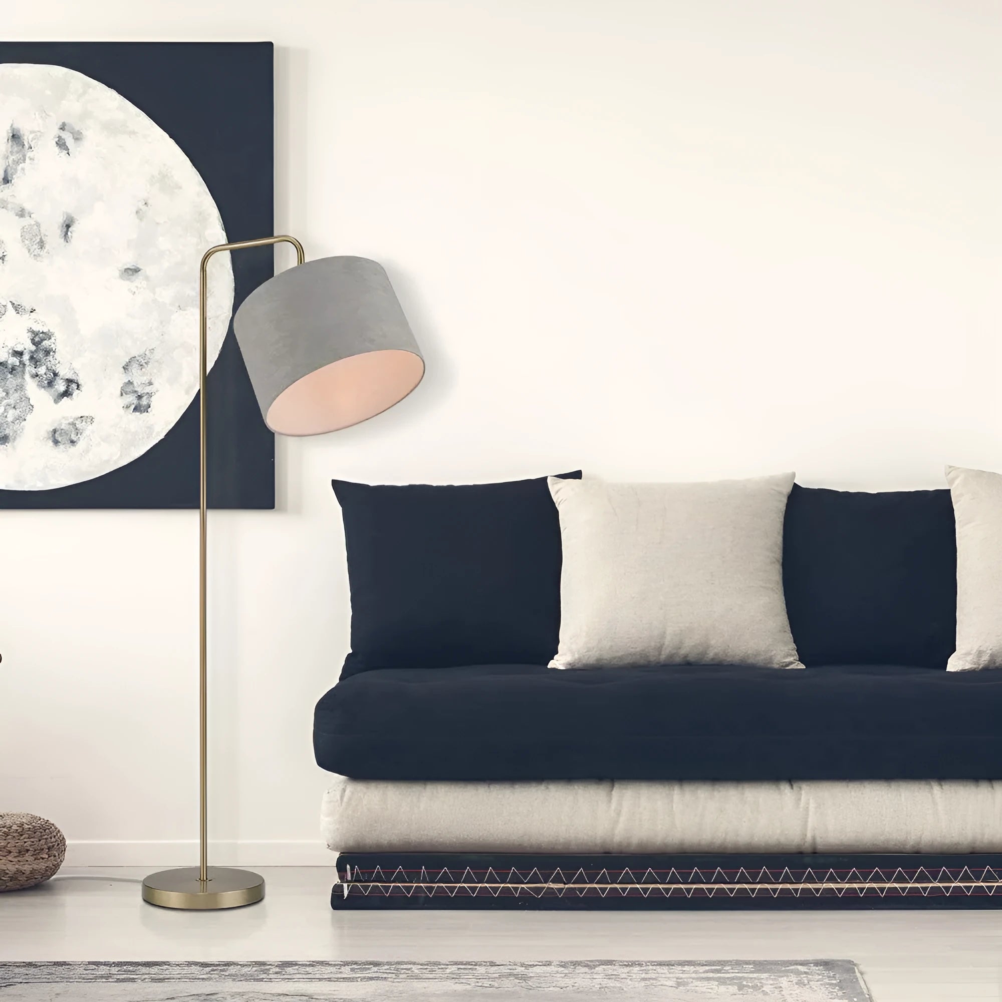 Black LED floor lamp with fabric shade and adjustable head in living room setting