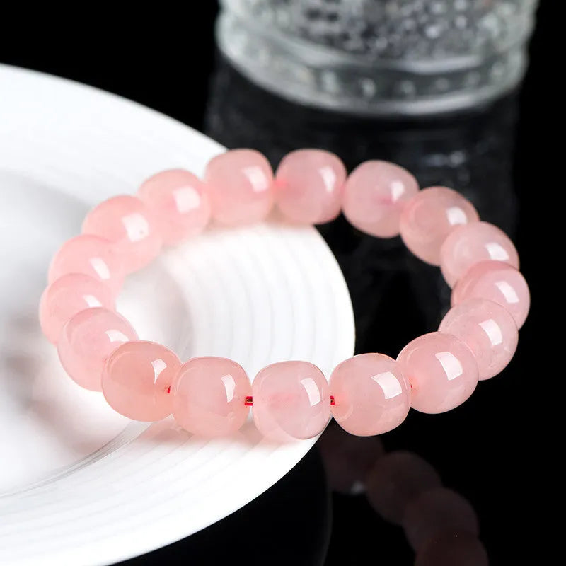 Natural pink crystal barrel bead bracelet with 8x10mm geometric polished beads