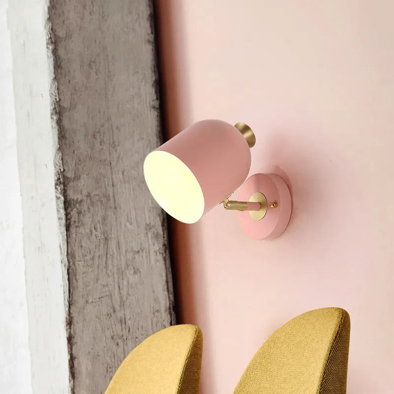 Compact aluminium single-head wall lamp with a mirror front, shown in a choice of colours.