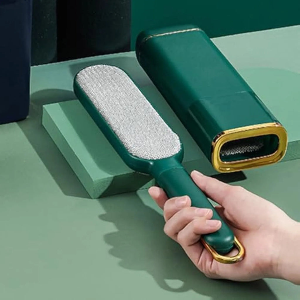 A reusable double-sided plush pet hair remover brush with a storage box base, shown in blue.