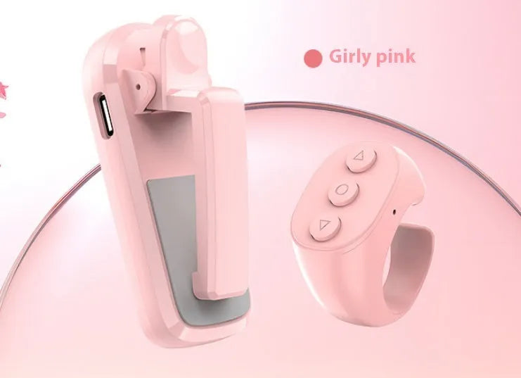 Wireless page turner remote control with clicker attachments in black, white, and pink colours