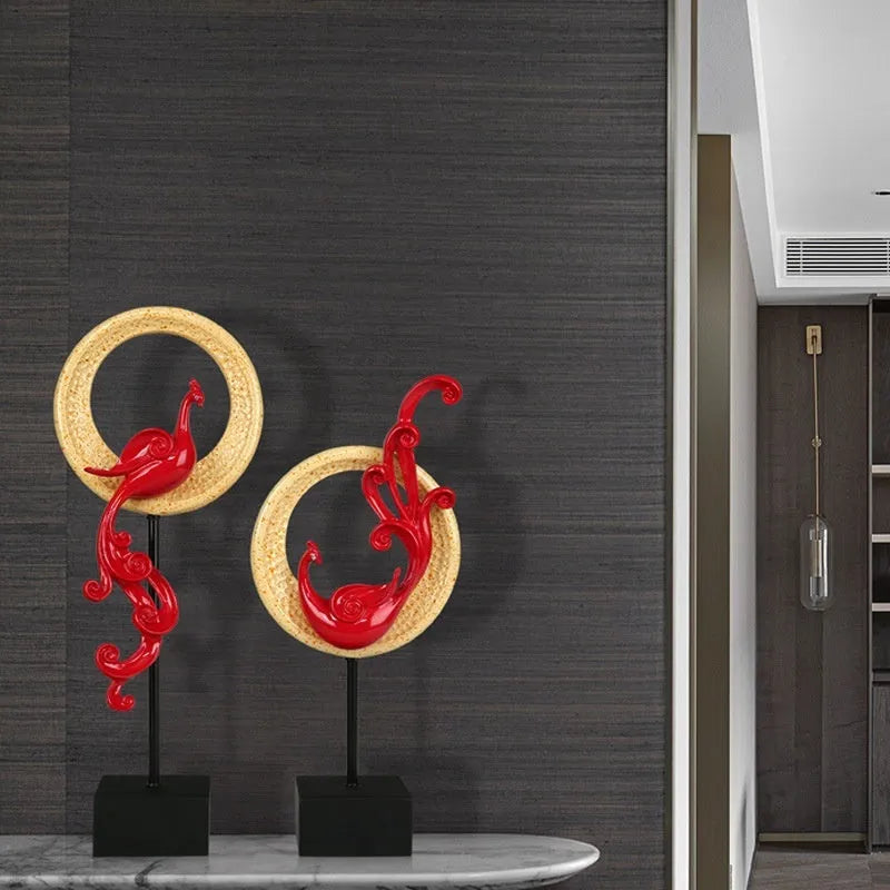 European style plastic resin phoenix ornament in rose gold colour on a table.