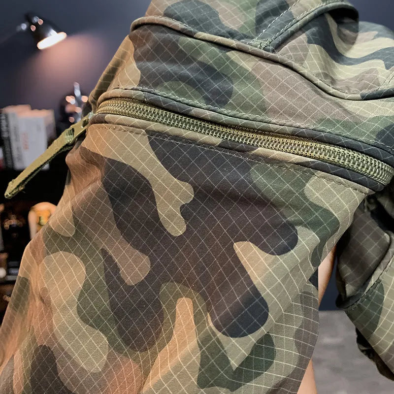Men's camouflage pattern cargo shorts shown in loose knee-length fit on a mannequin