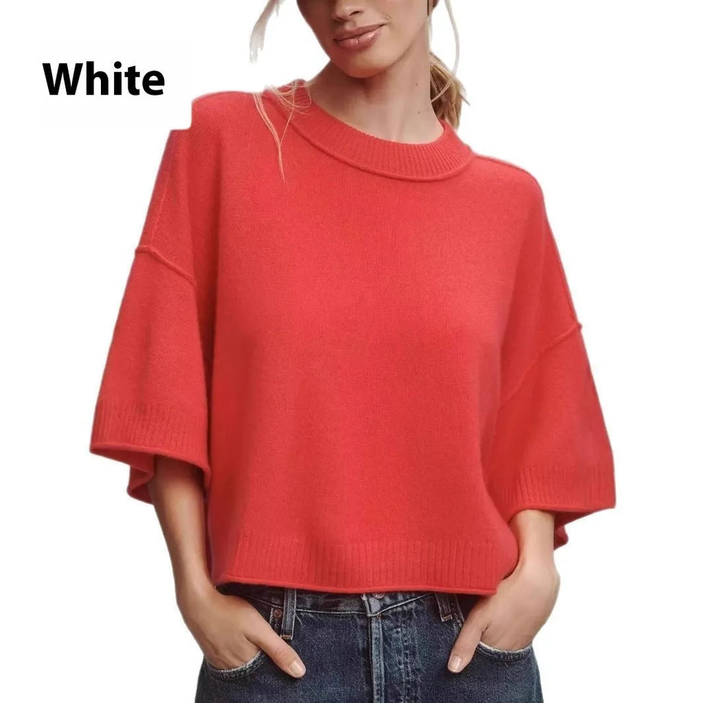 Red women's short viscose T-shirt with an exposed navel design on a model