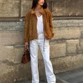 Retro solid colour loose fit long sleeve jacket on a hanger