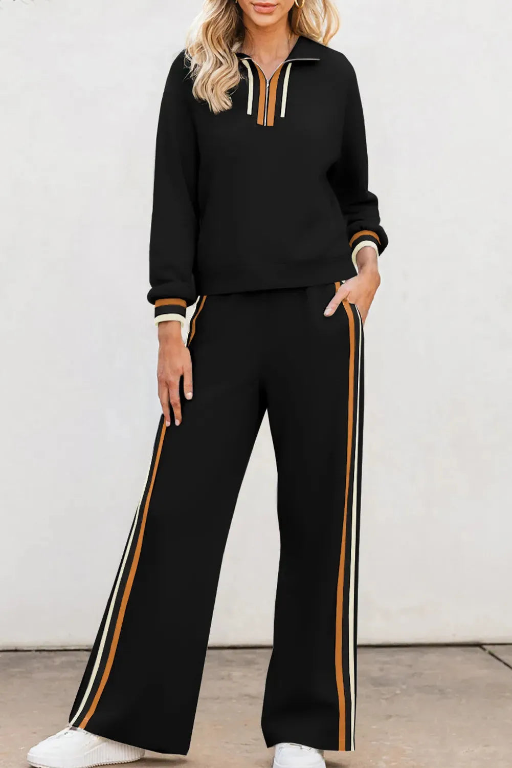 Black striped patchwork quarter zip pullover and loose trousers loungewear set on model