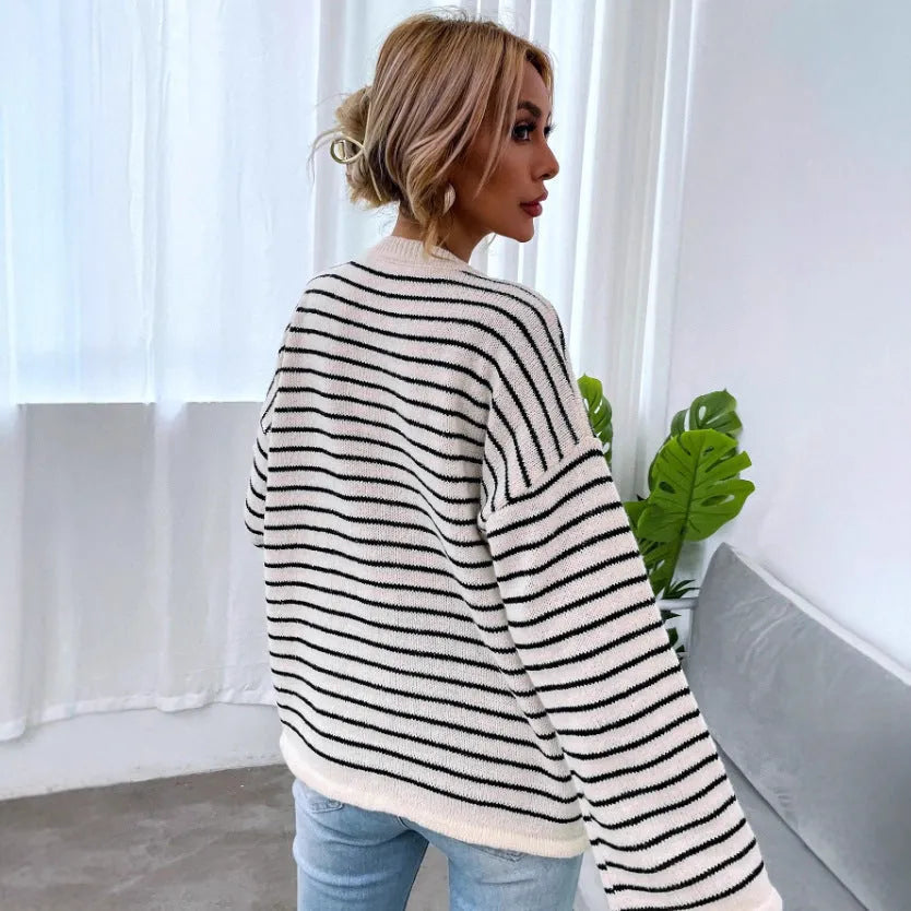 Black women's striped long sleeve top with drop-shoulder sleeves and contrast colour details