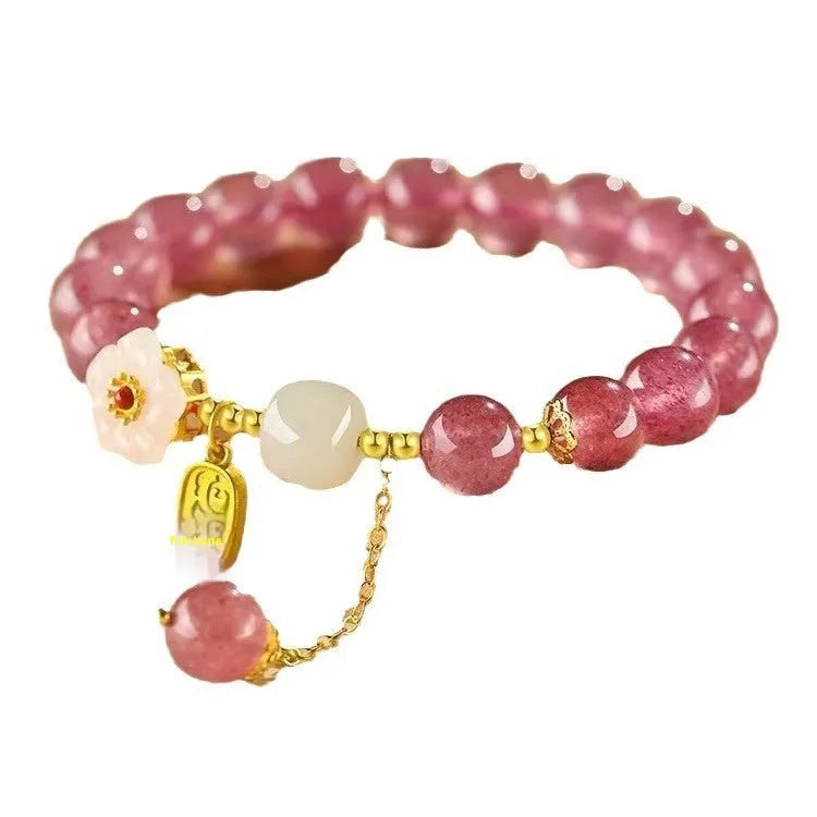 Handcrafted strawberry quartz crystal bracelet with green strawberry quartz moon charm for women