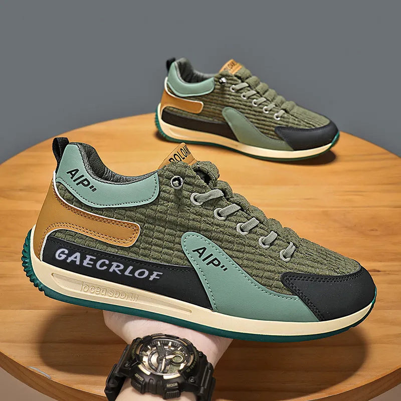 Men's grey and green lightweight mesh running shoes with round toe and lace-up front