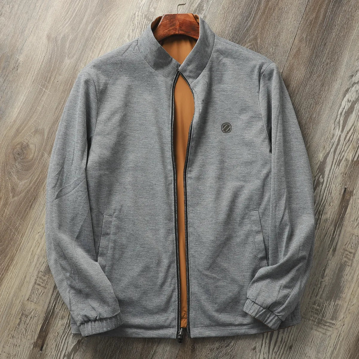 Men's stand collar casual jacket in polyester blend fabric available in multiple colours with Asian sizing options