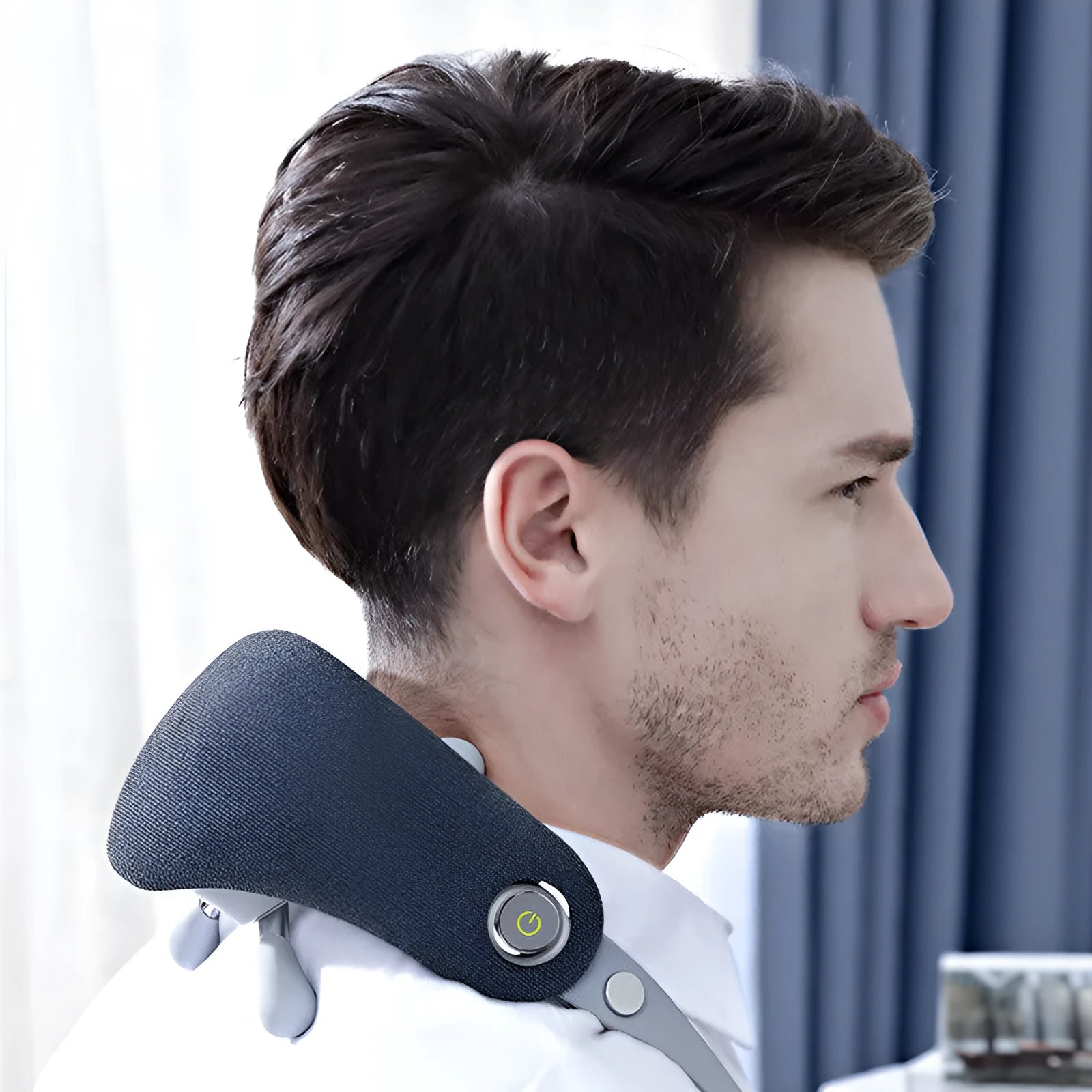 Dark blue rechargeable neck massager with imitation hand grip for home use on a neutral background