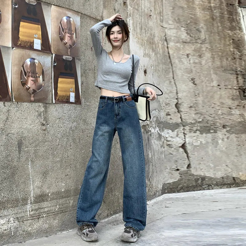 Women's high-waisted straight-leg jeans in retro blue cotton denim showing front view