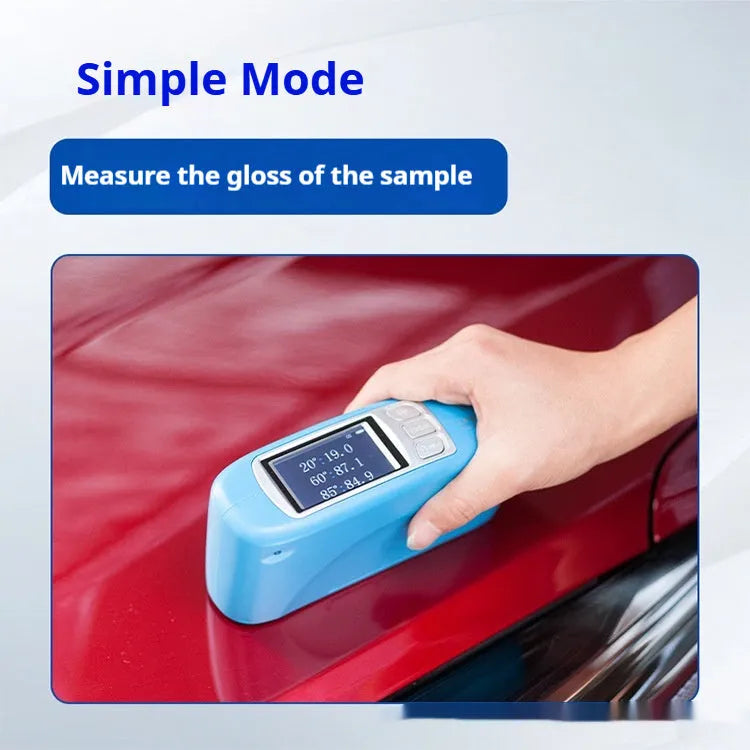 Handheld ceramic brightness stone portable glossiness tester gloss meter on a work surface.