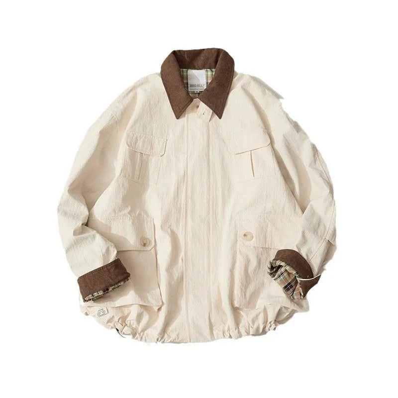 Green casual jacket with side seam pockets on a hanger