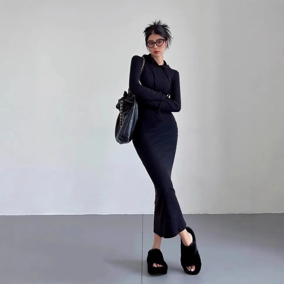 Women's long sleeve hooded sheath dress in light grey, shown over-the-knee length.