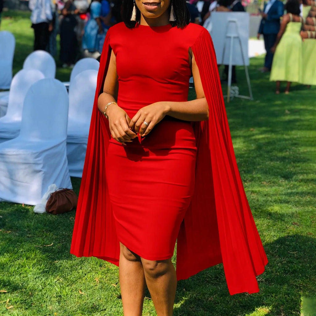 Women's long sleeve evening dress with pleated shawl collar in a choice of colours.