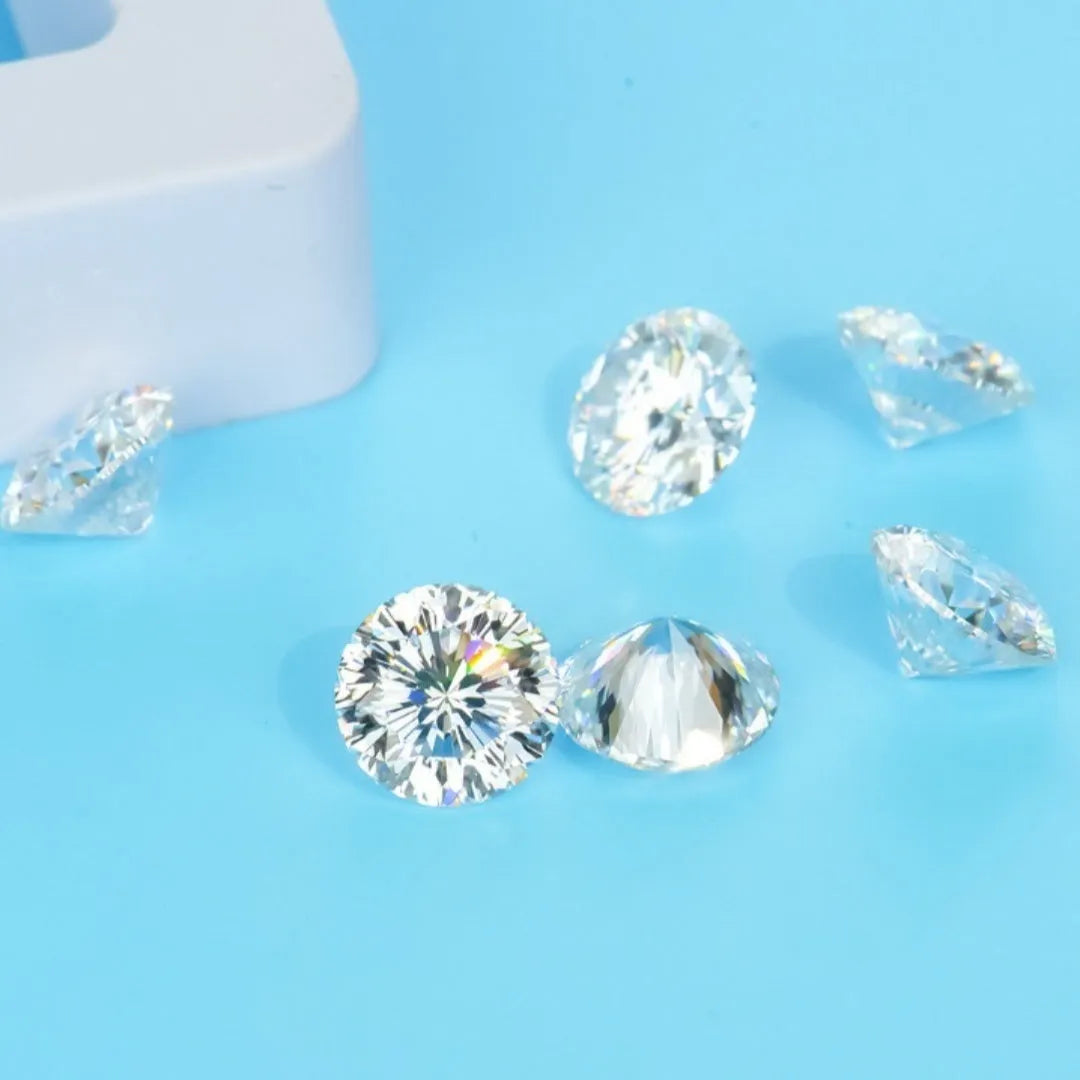 Round moissanite gemstone with eight hearts and eight arrows cut on a grey background.