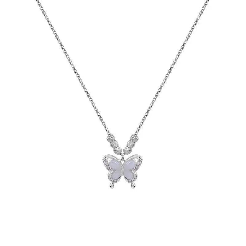 Women's silver opal butterfly necklace on cross chain with square line design