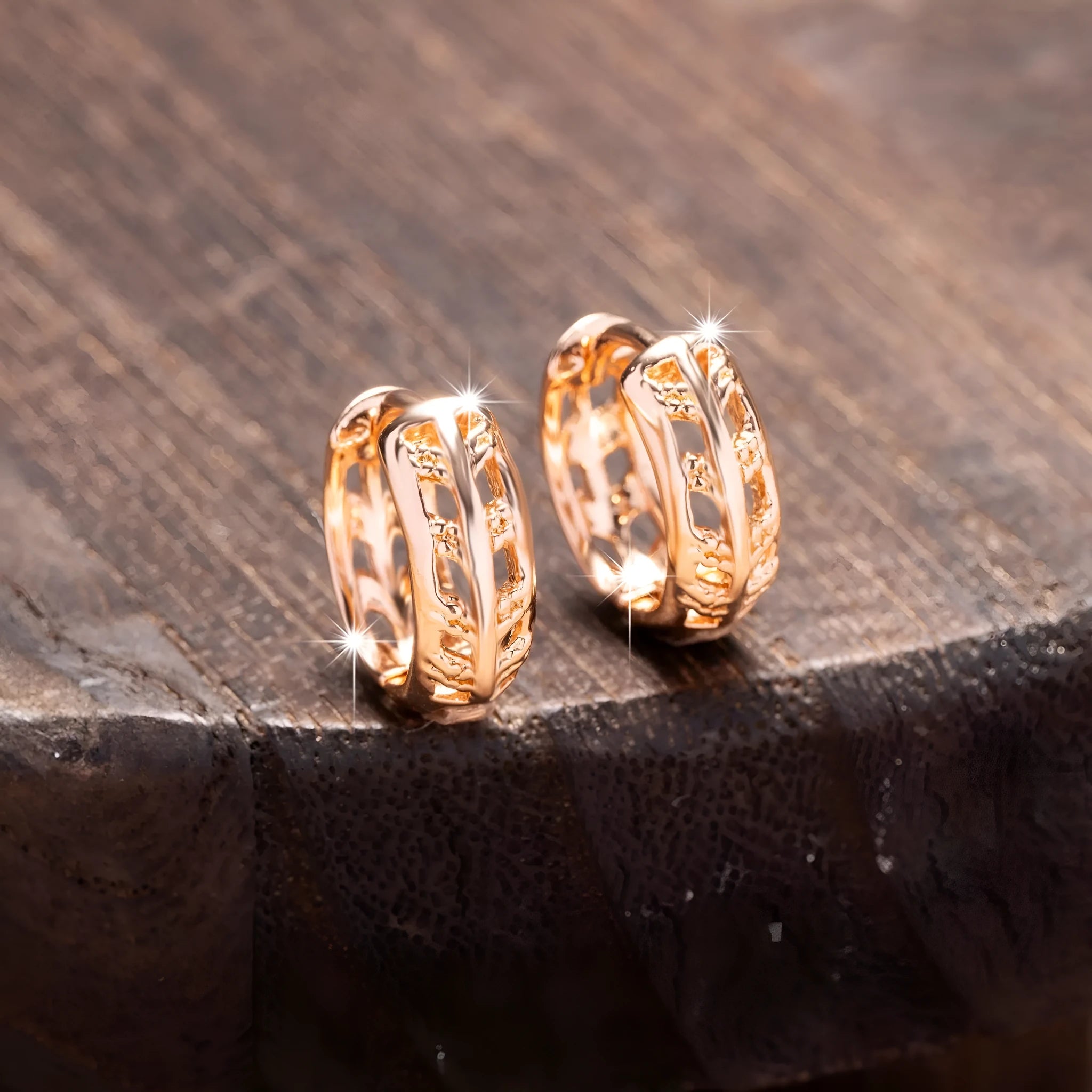 Rose gold plated hollowed-out copper earrings in a leaf shape design