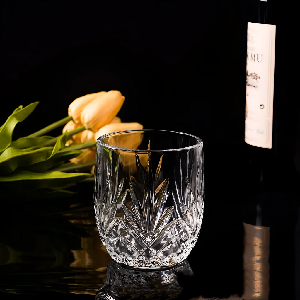 Crystal clear thick bottom whiskey glass with heavy base on a table