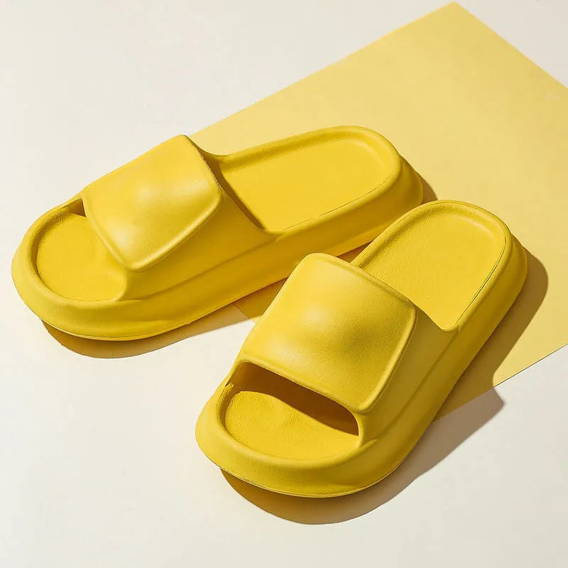 A pair of thick-soled EVA foam flip-flop slippers in a choice of seven colours on a plain background.