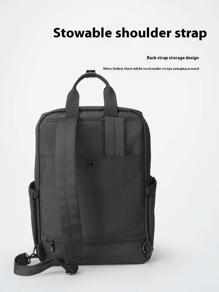 Elegant black Oxford cloth computer backpack with 20-35 litre capacity and polyester lining.