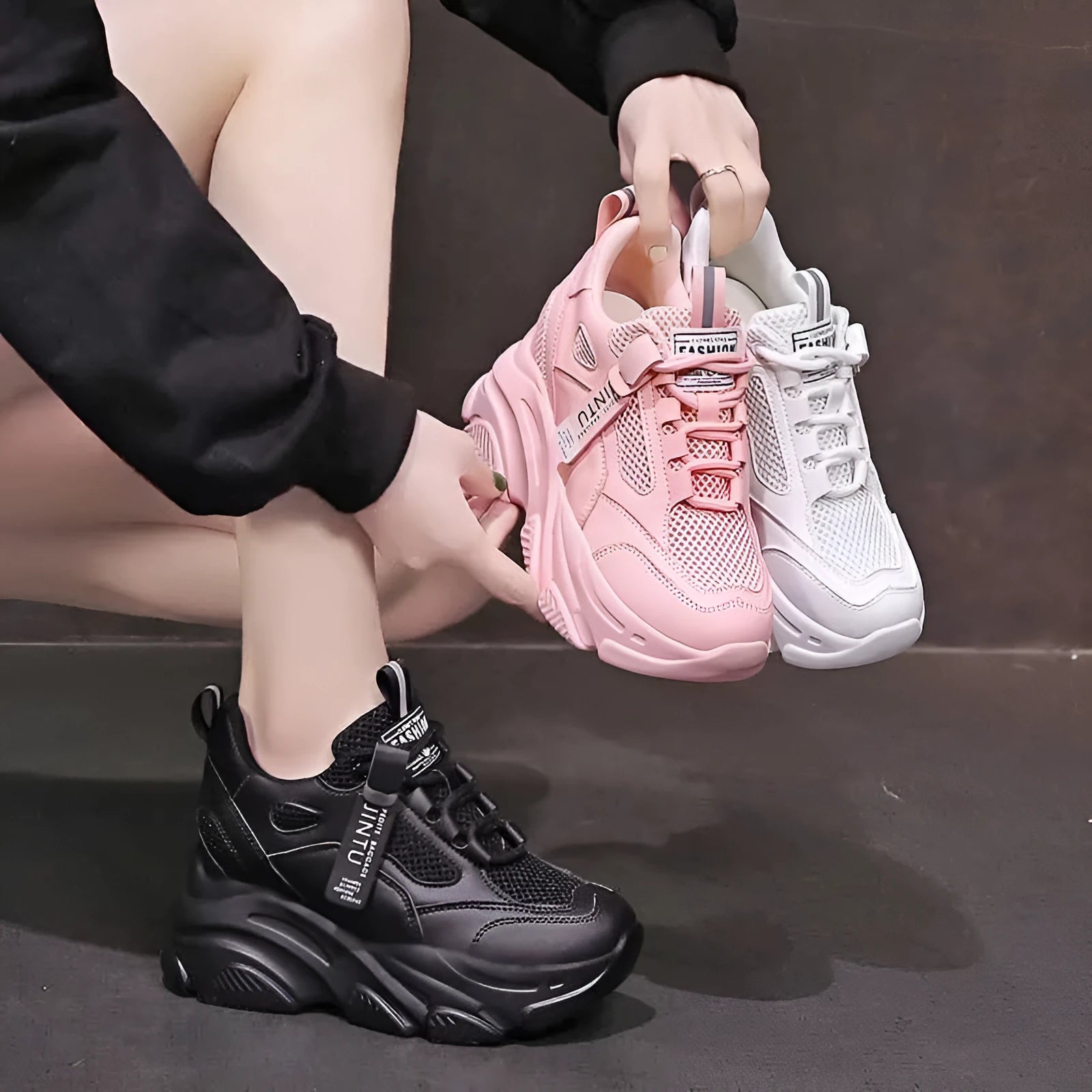 Women's black casual platform shoes with mesh upper and hollow-out design featuring toe holder