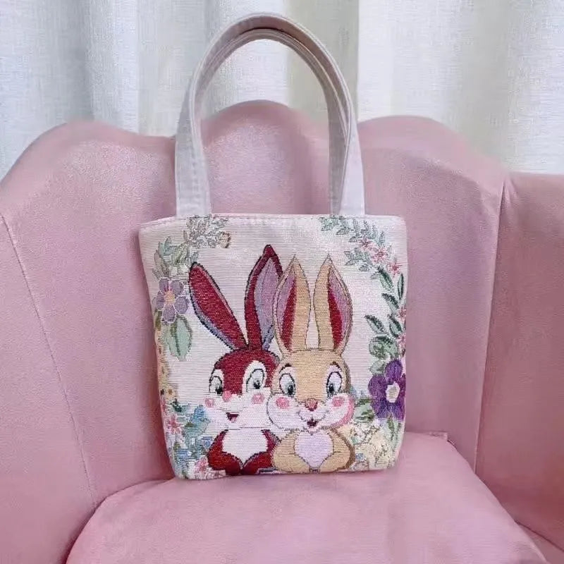 Double-sided gold wire embroidered canvas bag in small, medium, or large size.