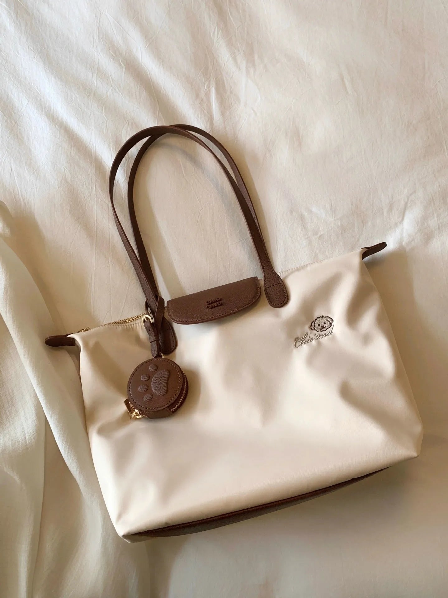 Large capacity Oxford cloth tote shoulder bag in pink with sandwich pocket and mobile phone pocket design